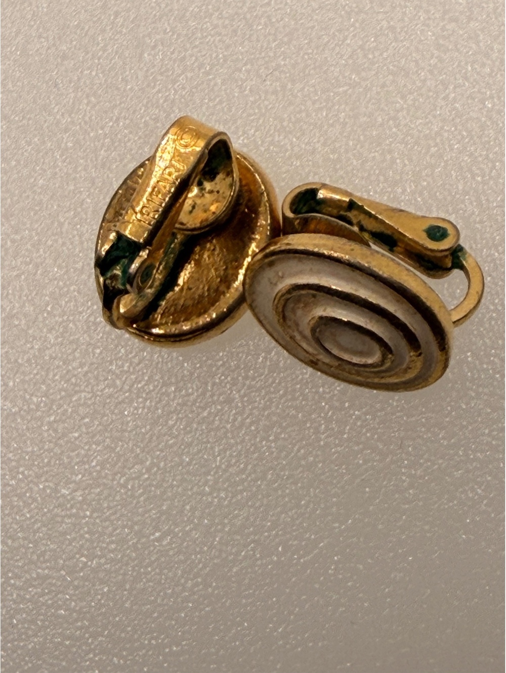 Gold tone spiral clip earrings
